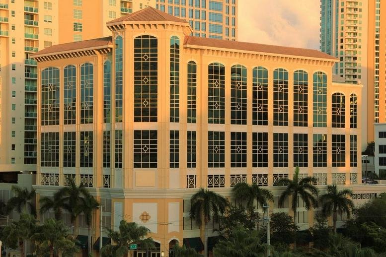 Exterior view of the Mediterranean-style building at 300 South East 2nd Street.