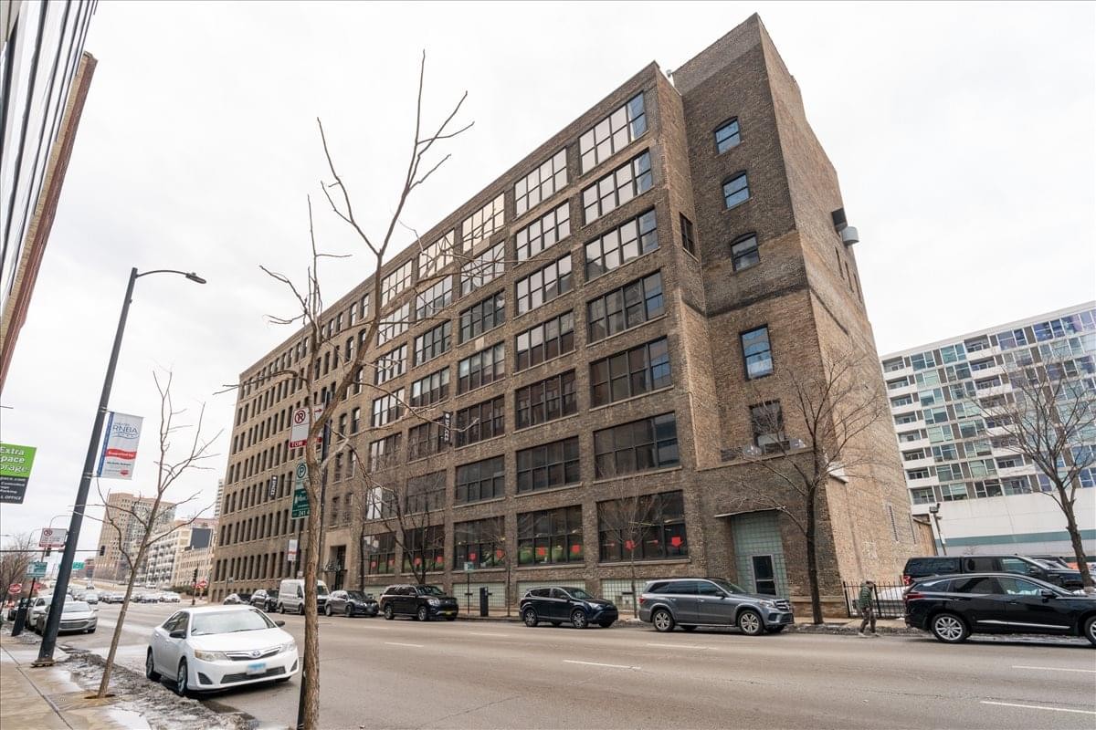 Exterior view of the historic brick facade of the Adlake Building.