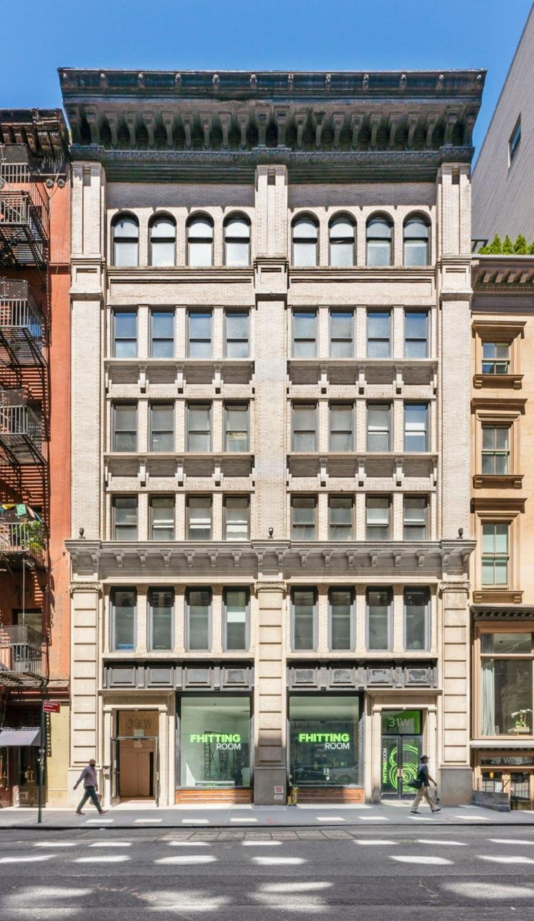 Exterior view of the historic stone-facade building at 33 W 19th St, 4th Floor.