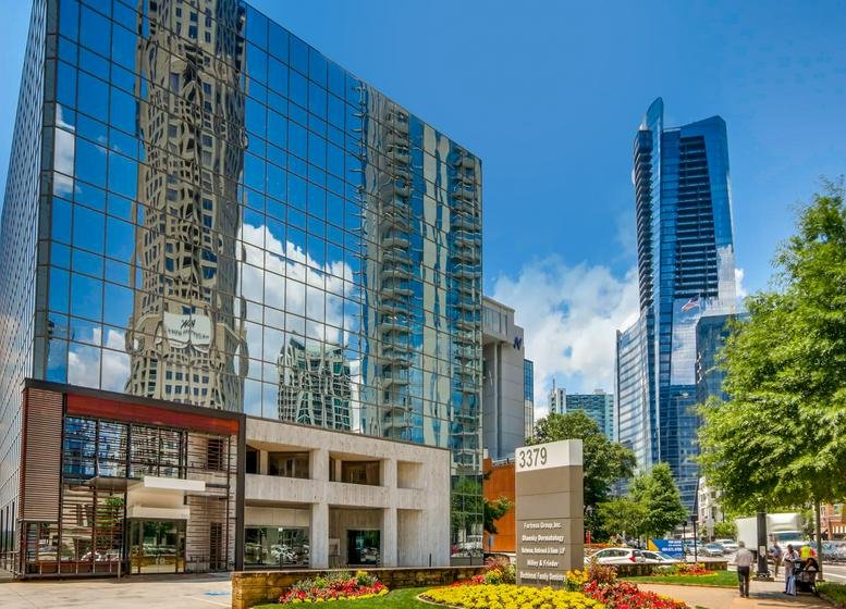 Exterior view of the glass-facade building at 3379 Peachtree Road NE.