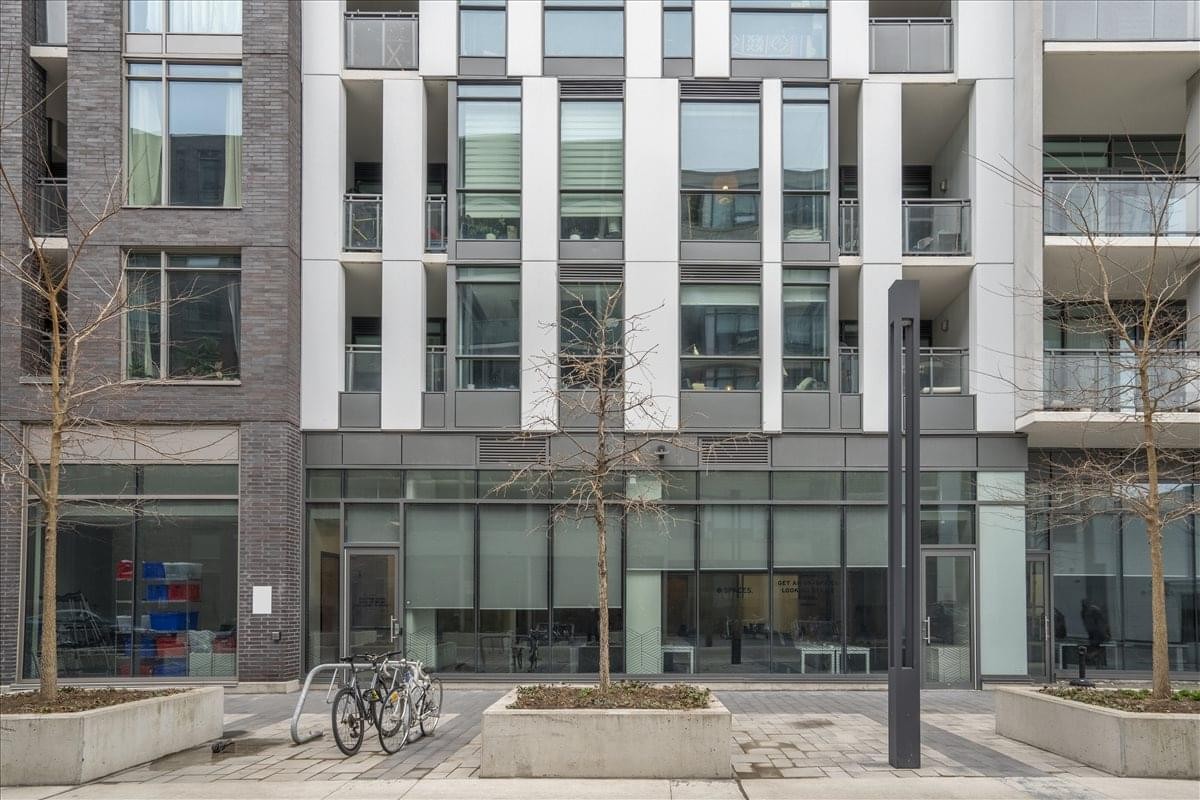 Exterior view of the contemporary glass and brick facade at 34 Minowan Miikan Lane.