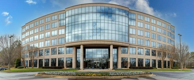 Exterior view of the building at 3480 Preston Ridge Road.