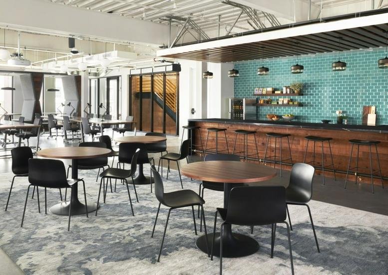 Spacious communal dining area and modern kitchen at 350 East 400 South.