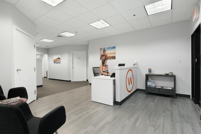 Exterior view of the brick building at 350 Lincoln Street, Suite 2400.