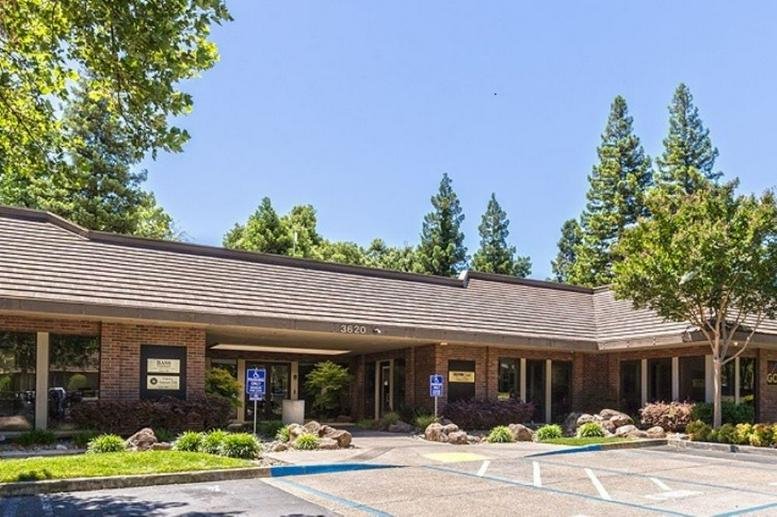 Exterior view of the brick-facade building at 3626 Fair Oaks Blvd, Suite 100.