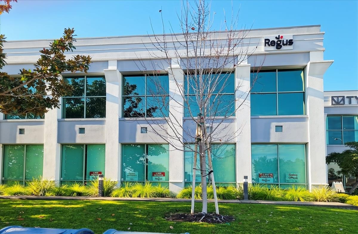 Exterior view of the white facade building at 371 Bel Marin Keys Boulevard.