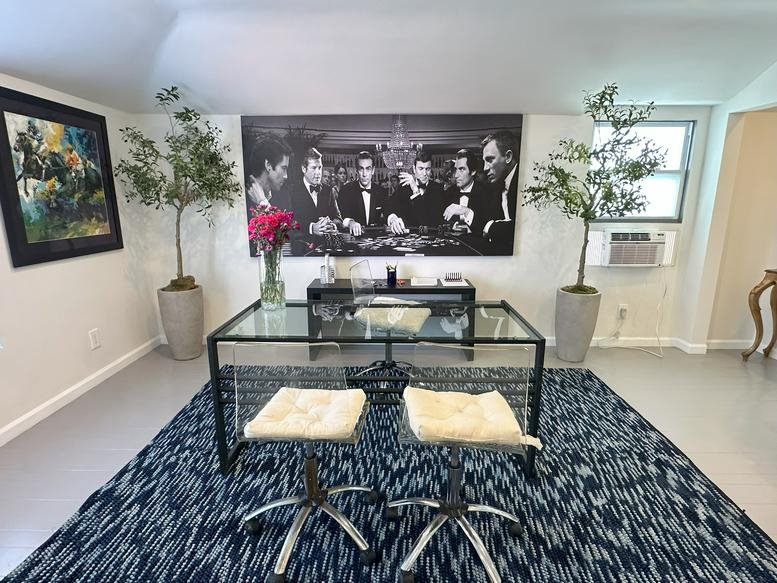 Long narrow driveway with a view of the street in the distance