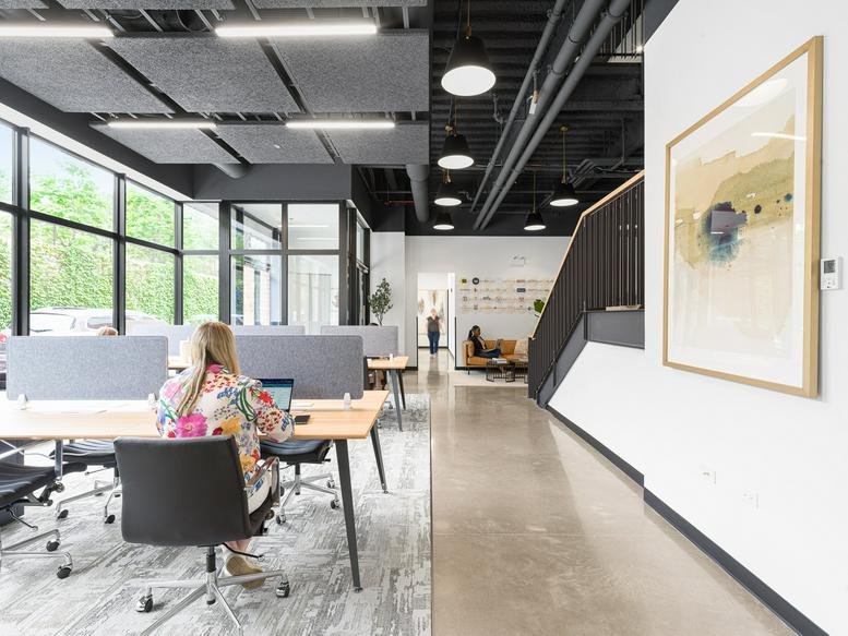 Spacious open-plan workspace at 3838 N Ravenswood Avenue with natural light and modern workstations.