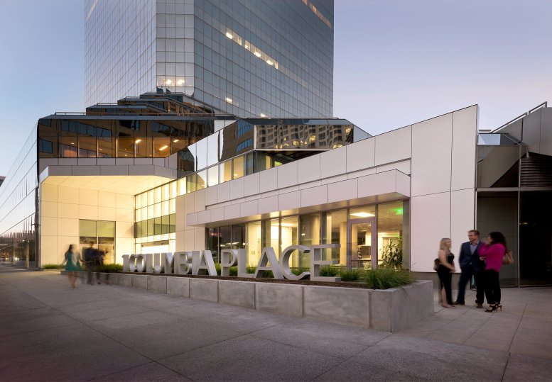Exterior view of the glass-facade 1 Columbia Place building at 401 West A Street.