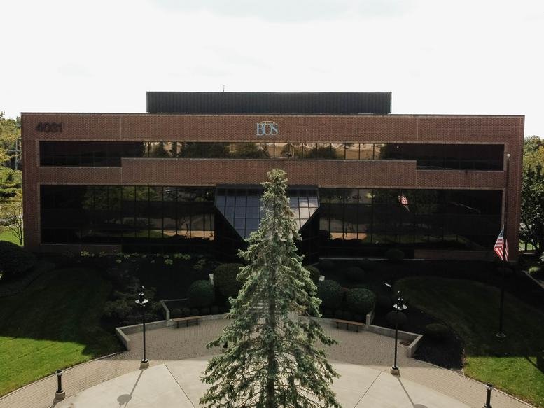 Exterior view of the brick facade at 4031 Colonel Glenn Highway.