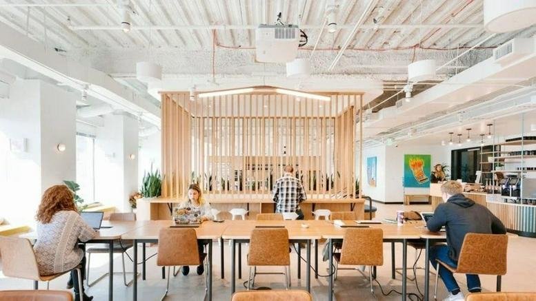 Spacious communal lounge and coworking area at 419 Park Avenue South, NoMad, Midtown South, New York City.