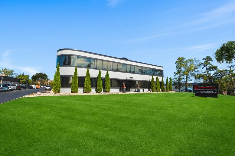 Exterior view of the modernist building at 43000 West 9 Mile Road.