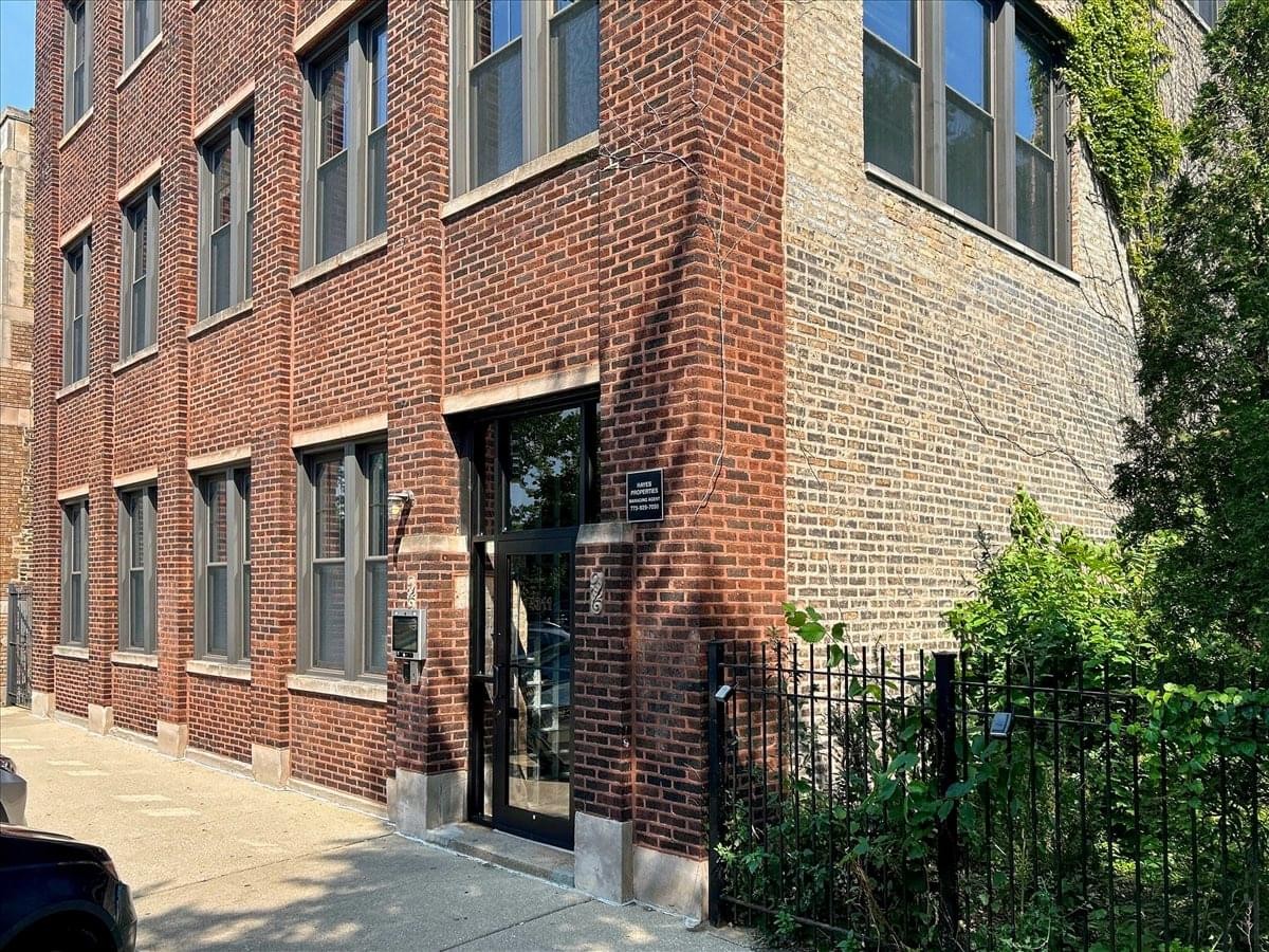 Exterior view of the brick industrial-style building at 4311 North Ravenswood Avenue.