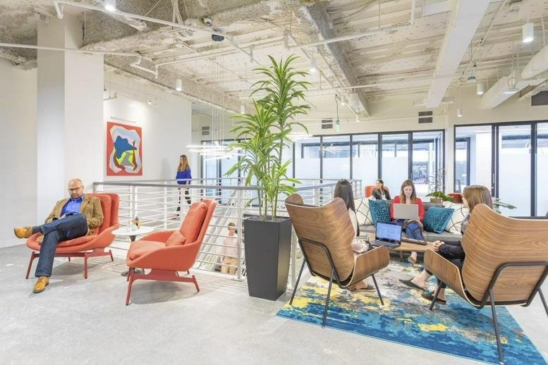 Spacious coworking lounge at 44 South Broadway, featuring stylish seating and an open-concept design.