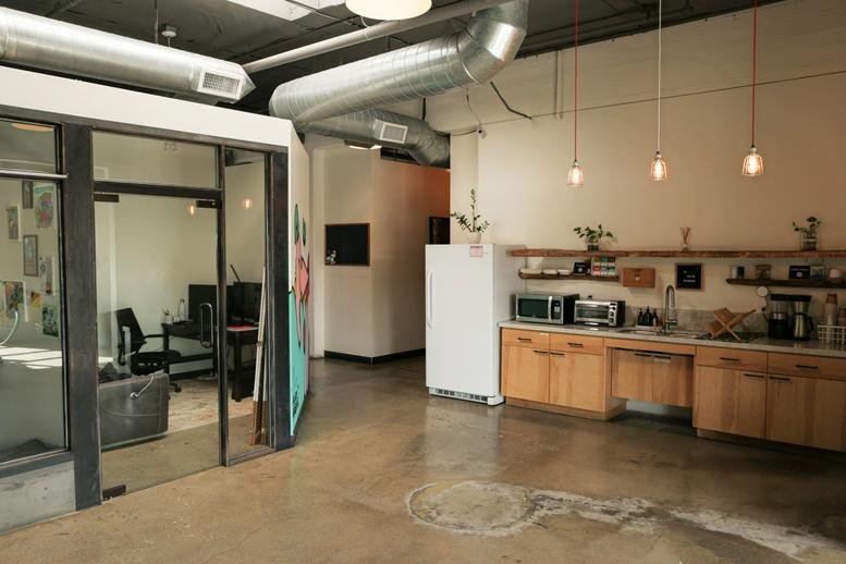 Spacious communal kitchen and lounge area at 440 East Route 66, Glendora, California.