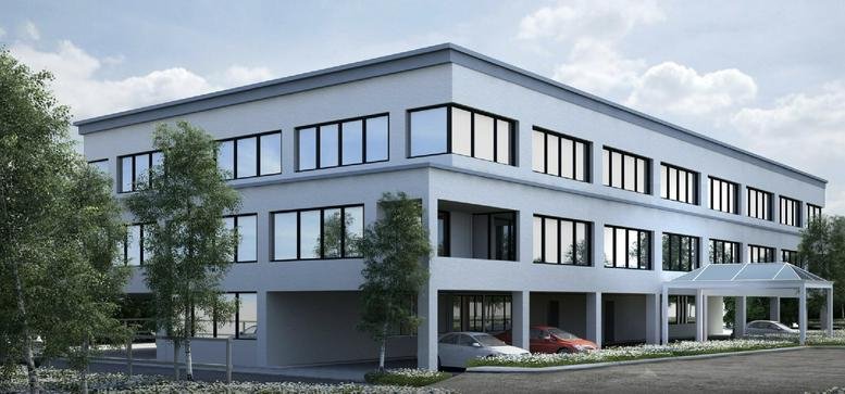 Exterior view of the modern three-story office building at 500 Post Rd E.