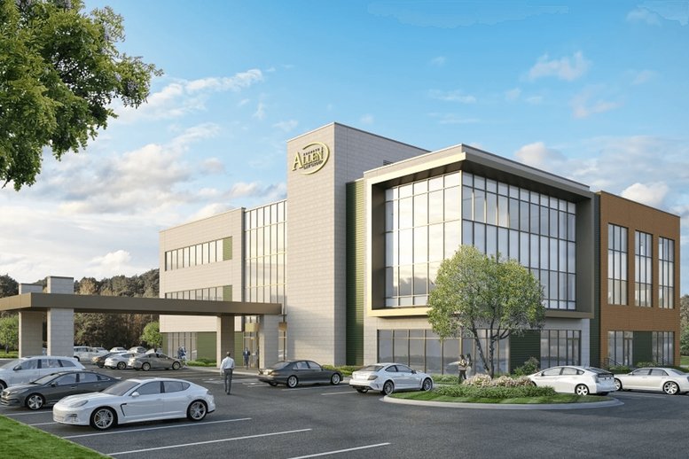 Exterior view of the modern glass and stone building at 501, Allen Court, Chesterton, Indiana.