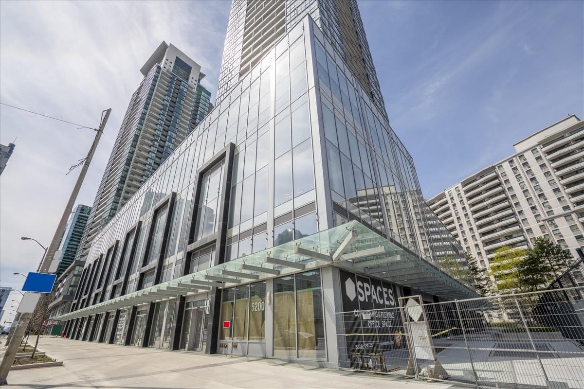 Exterior view of the modern glass-facade tower at 5200 Yonge Street.