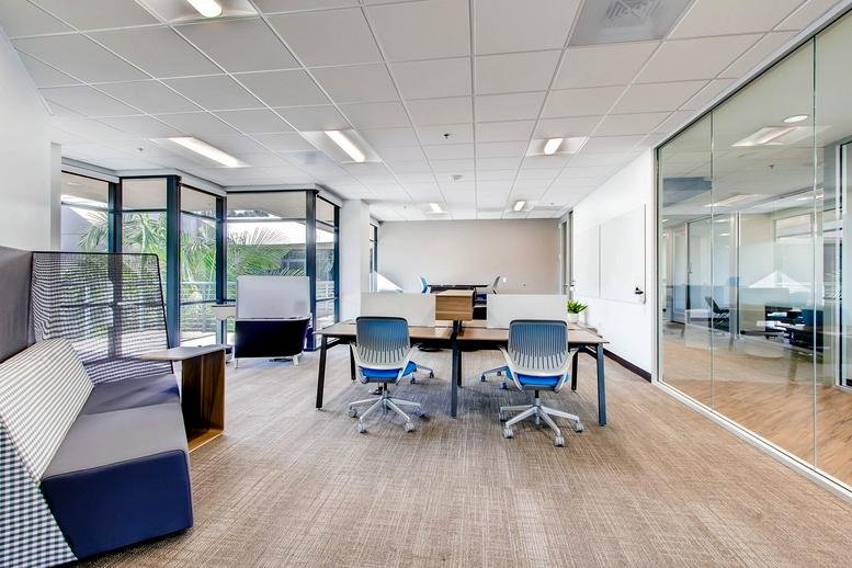 Spacious communal coworking area at 5857 Owens Avenue, Suite 300, Carlsbad, California.