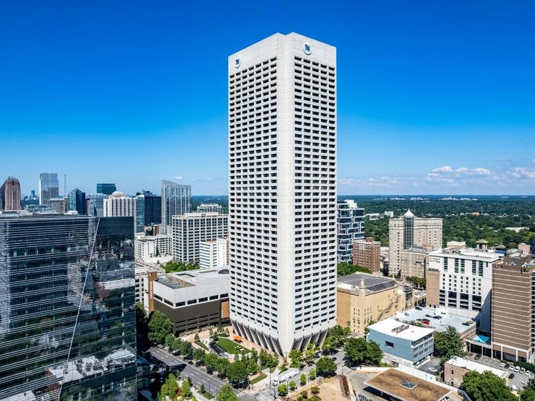 Exterior view of the white high-rise skyscraper at 600 W Peachtree St NW.