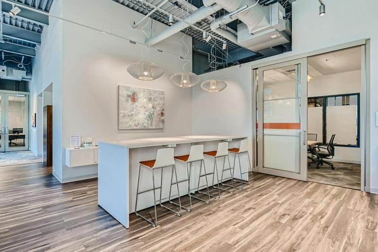 Bright communal lounge at 6105 South Main Street, Suite 200, Southlands, Aurora, Colorado featuring a breakfast bar.
