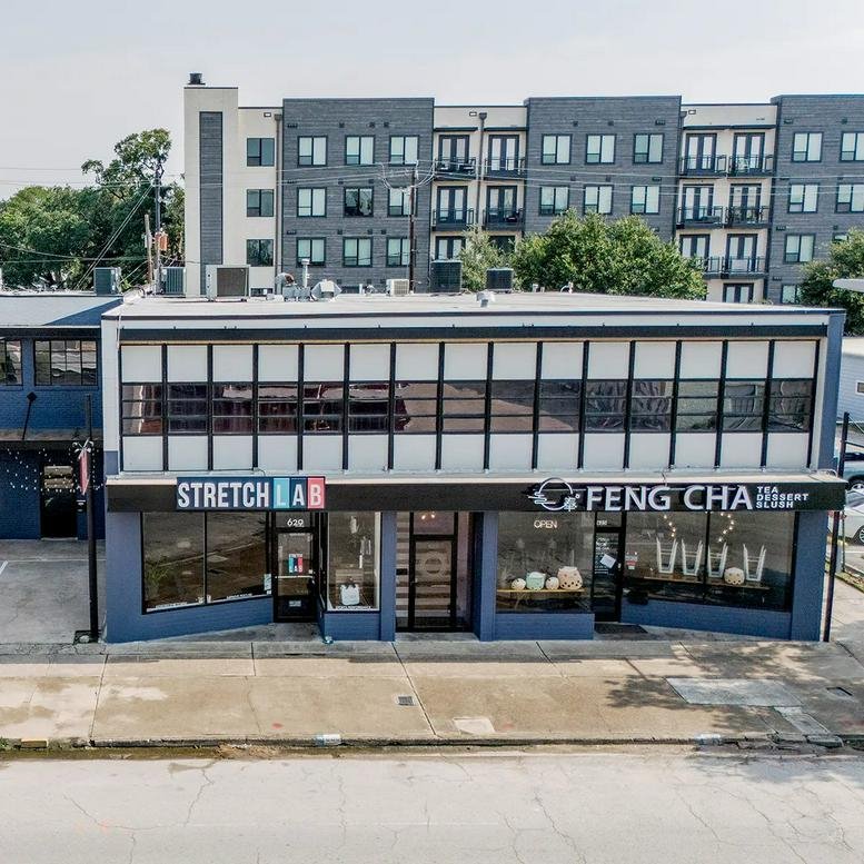 Exterior facade of the two-story retail and office building at 629 W. 19th St.