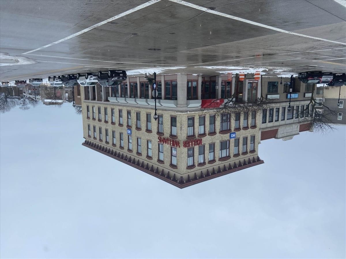 Exterior view of the historic brick building at 703 North 8th Street, 300.