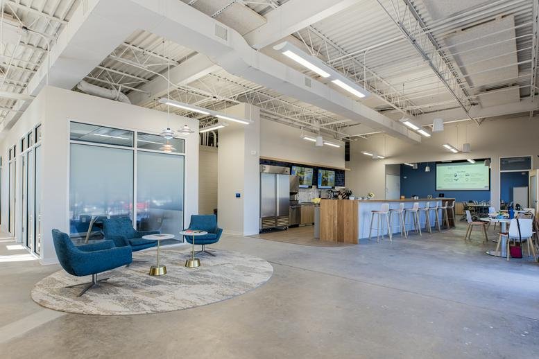 Bright, open-plan common area at 711 Main Street, Suite 103, North Wilkesboro with a cafe bar and lounge seating.