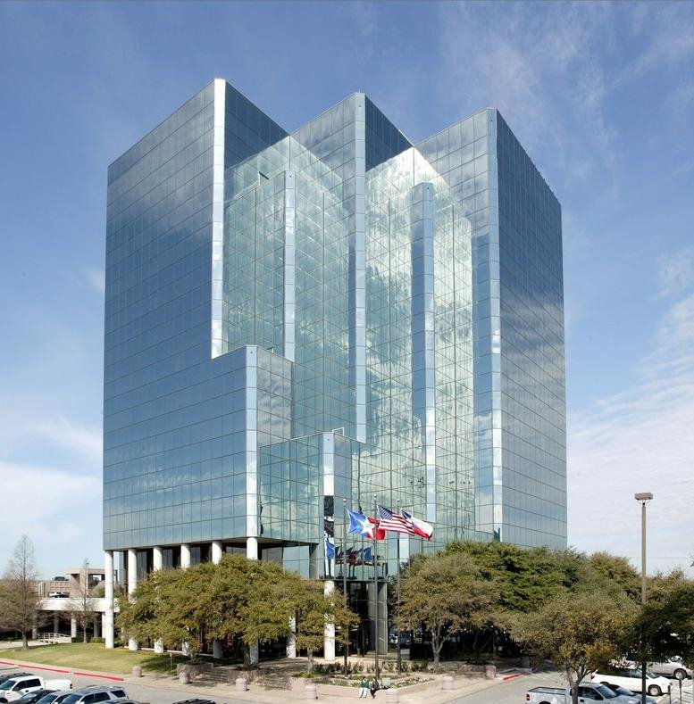 Exterior view of the glass-facade 7550 Interstate 10 West building.