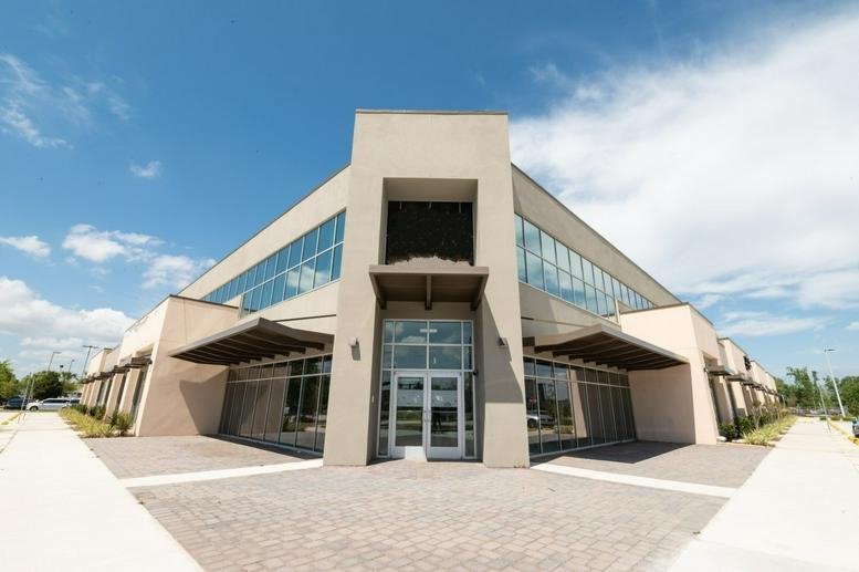 Exterior view of the contemporary two-story building at 7726 Winegard Road.