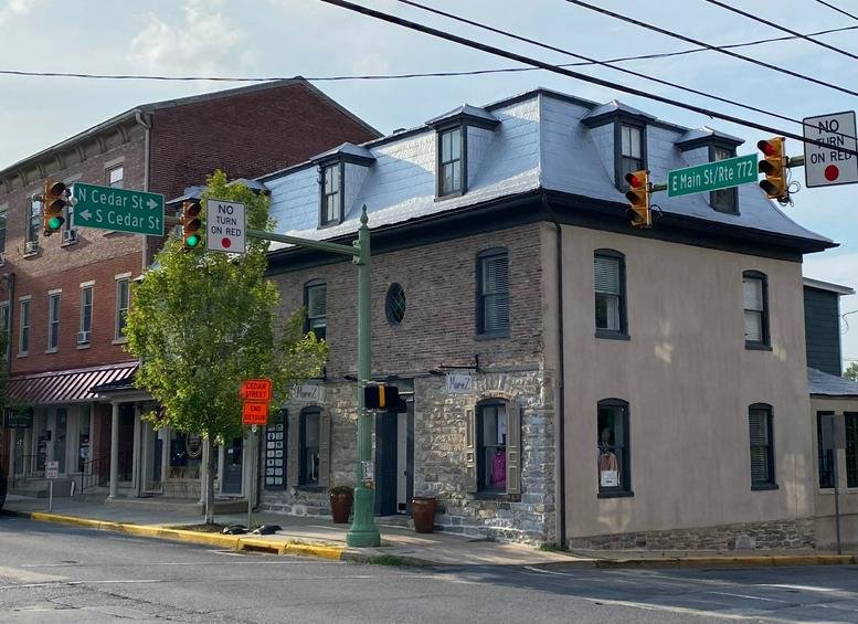 Exterior view of the historic brick and stone building at 79 East Main Street.