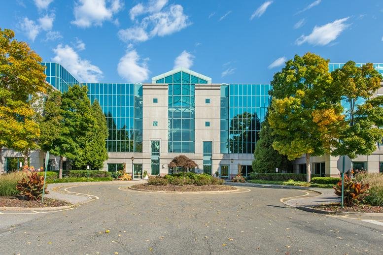 Exterior view of the glass-facade 8 Campus Drive, Suite 105, Parsippany, New Jersey.