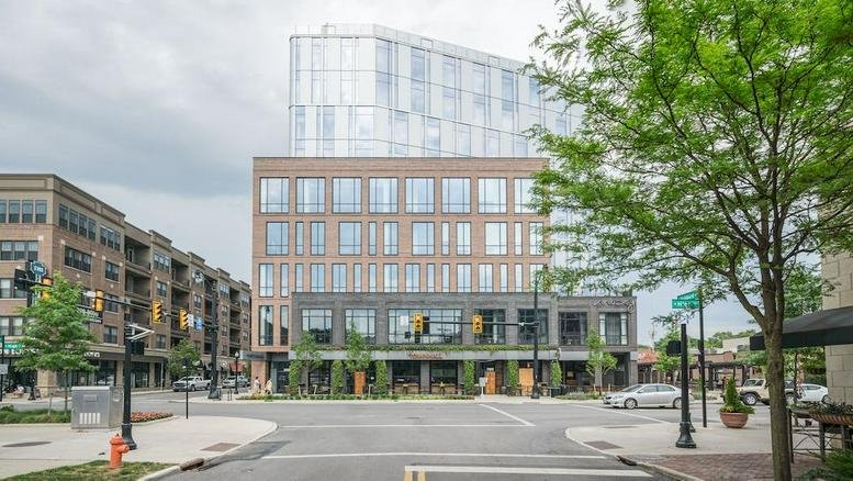 Exterior view of the brick and glass mixed-use building at 800 North High Street.