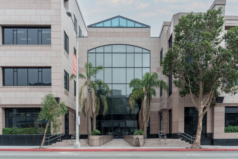 Exterior view of the granite and glass entrance at 808 Wilshire Boulevard, 2nd Floor.