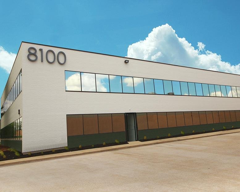 Exterior view of the white modern facade at 8100 Washington Avenue, West Loop.