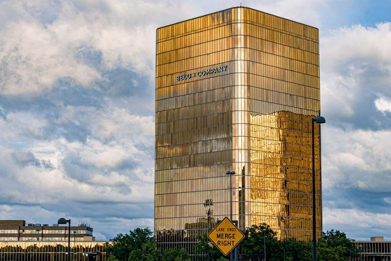 Exterior view of the gold-toned glass building at 8350 N Central Expy.