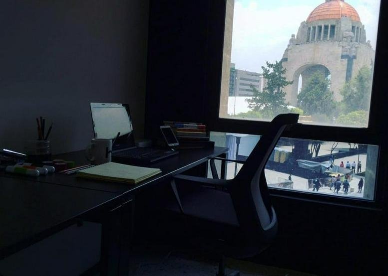 Office workspace at 9, Avenida de la República, Tabacalera, Mexico City with historic monument views.