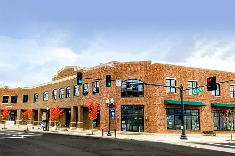 Exterior view of the brick facade and storefronts at 99 East Main Street, Suite 200, Franklin (Tennessee).