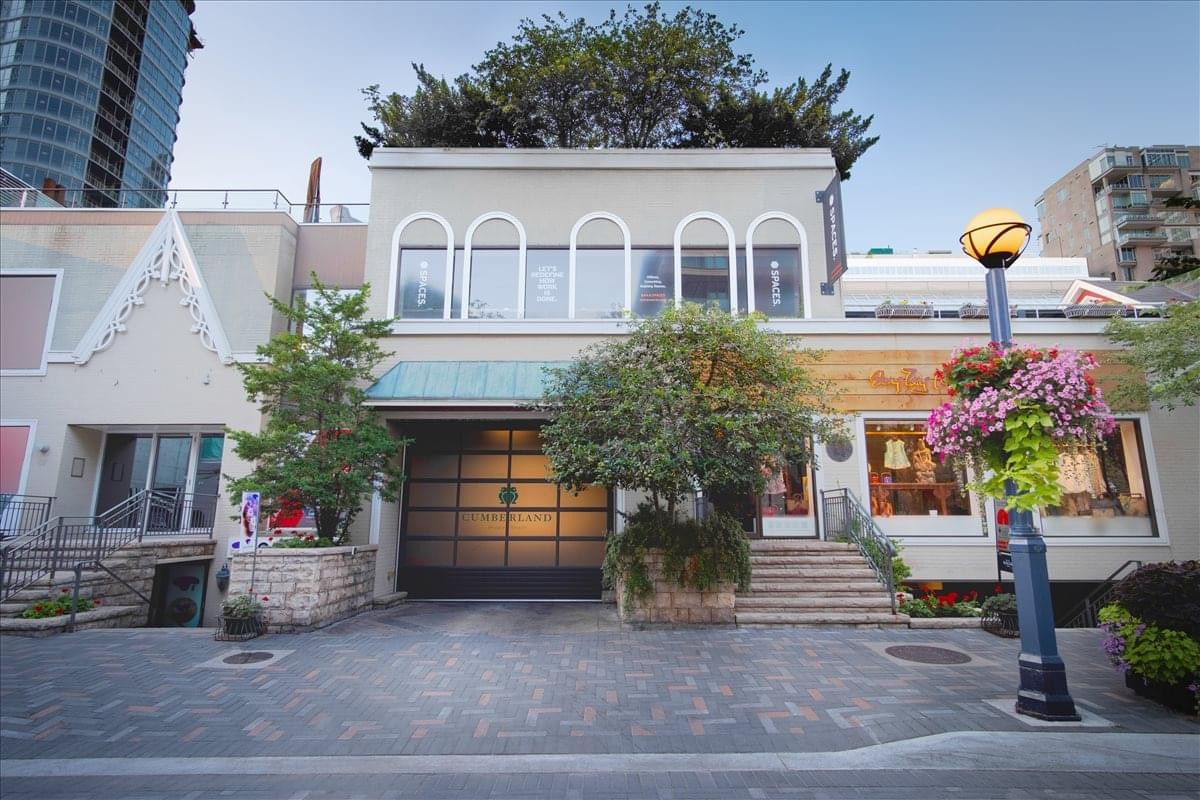 Exterior facade of the contemporary boutique building at 99 Yorkville Avenue.