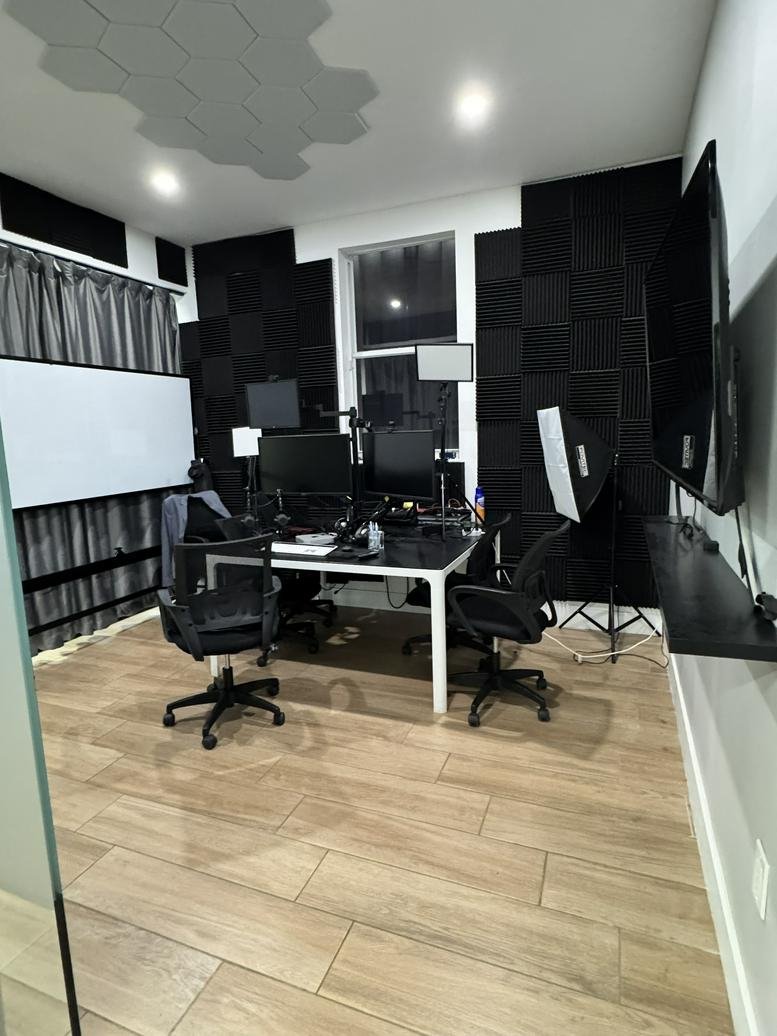 Private media production room with soundproofing, monitors, and studio lighting at 999 Northeast 125th Street.