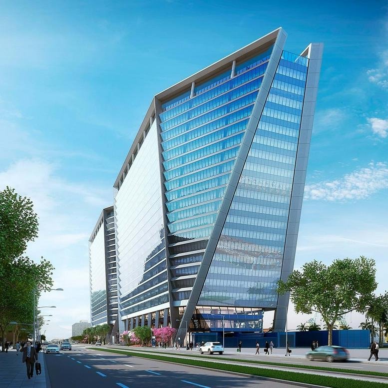 Modern glass exterior of the Aqwa, Avenida Oscar Niemeyer, 2000 building with unique angular architecture.