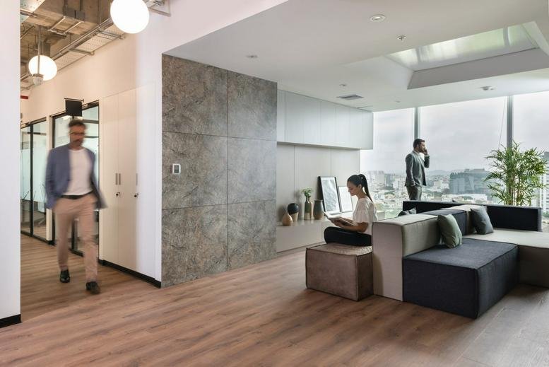 Bright lobby at Avenue Alberto Del Campo 411, Piso 10, Magdalena, Lima with lounge seating and city views.