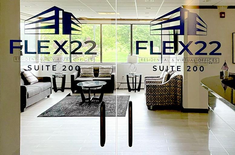 Branded glass entrance to the Flex 22, Bridgewater, New Jersey reception and lounge area.