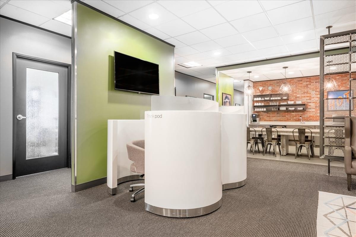 The modern lobby and lounge area at Old Town Square, Suite 450, 1 Chisolm Trail Road.