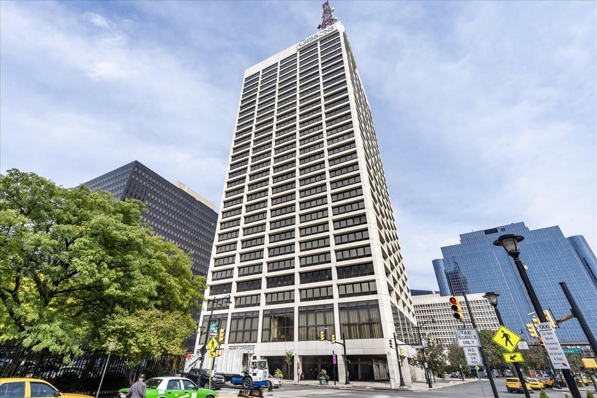 Exterior view of the high-rise 1 Gateway Center tower against a blue sky.