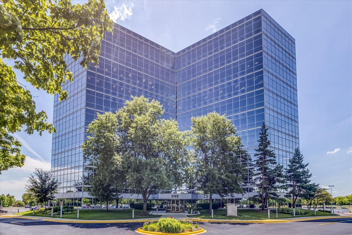Exterior view of the glass-facade 1 Westbrook Corporate Center in Westchester.