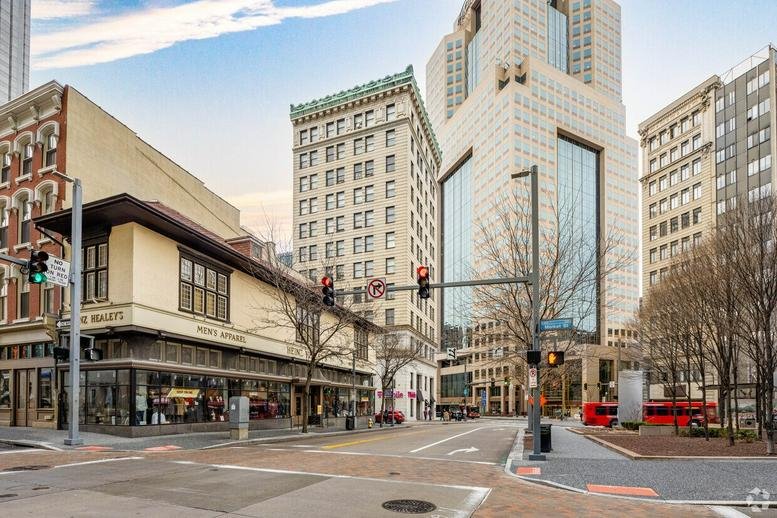 Exterior street-level view of the historic Diamond Building at 100 Fifth Avenue.