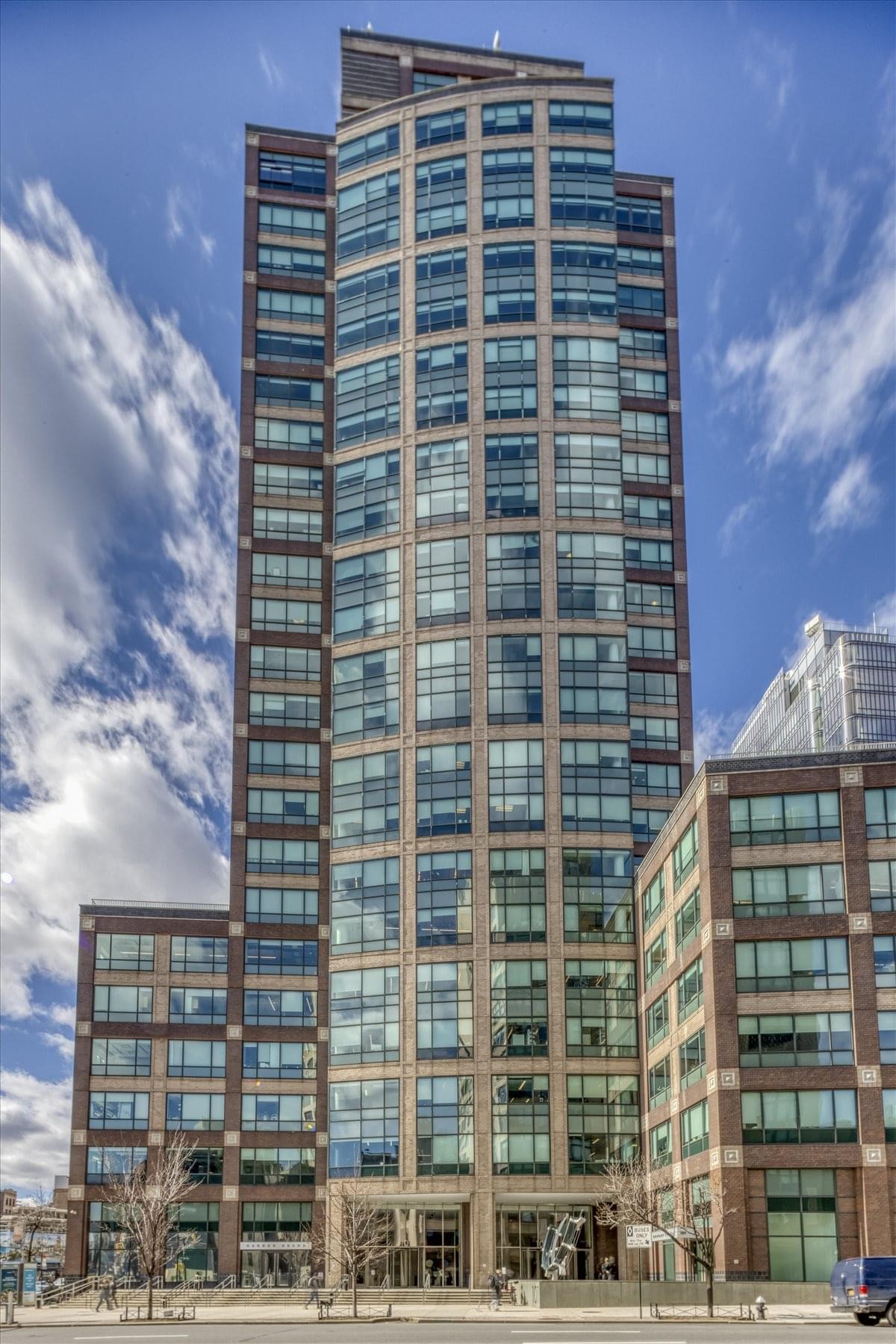 Exterior view of the brick and glass facade at 101 Avenue of the Americas.