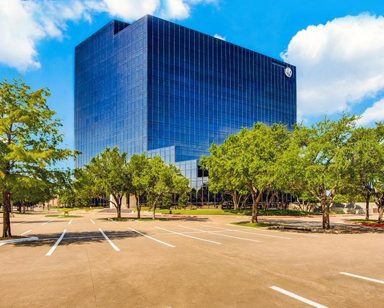 Exterior view of the glass-facade 101 East Park Boulevard in Plano.