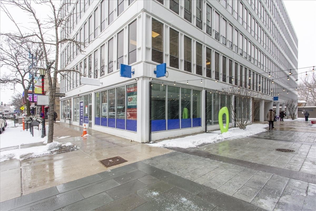 Corner exterior view of the multi-story Oak Park Business Centre building during winter.